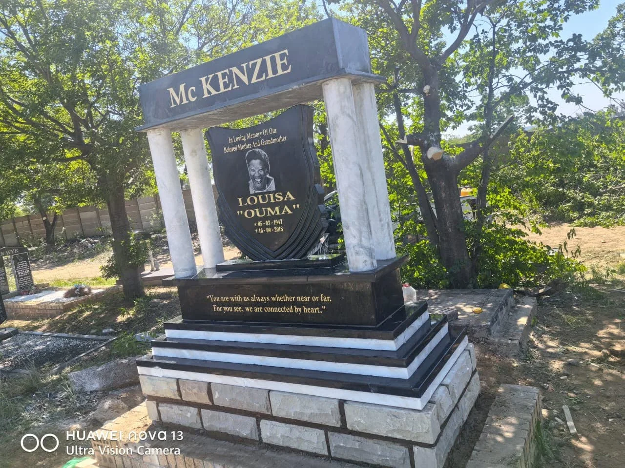 Red granite upright memorial headstone